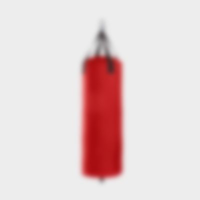 Red punching bag used for boxing and striking practice.