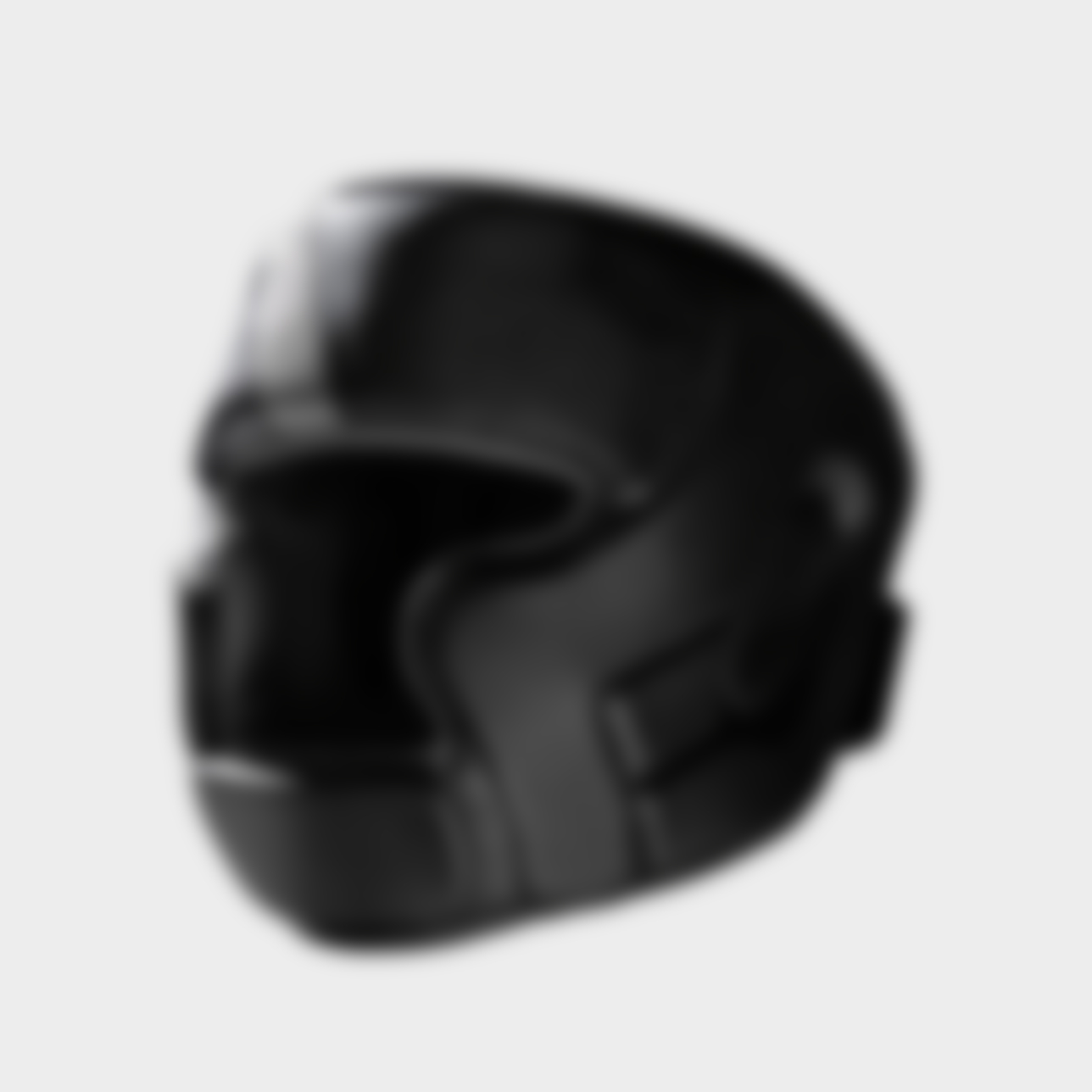 Black protective headgear for boxing or martial arts training.